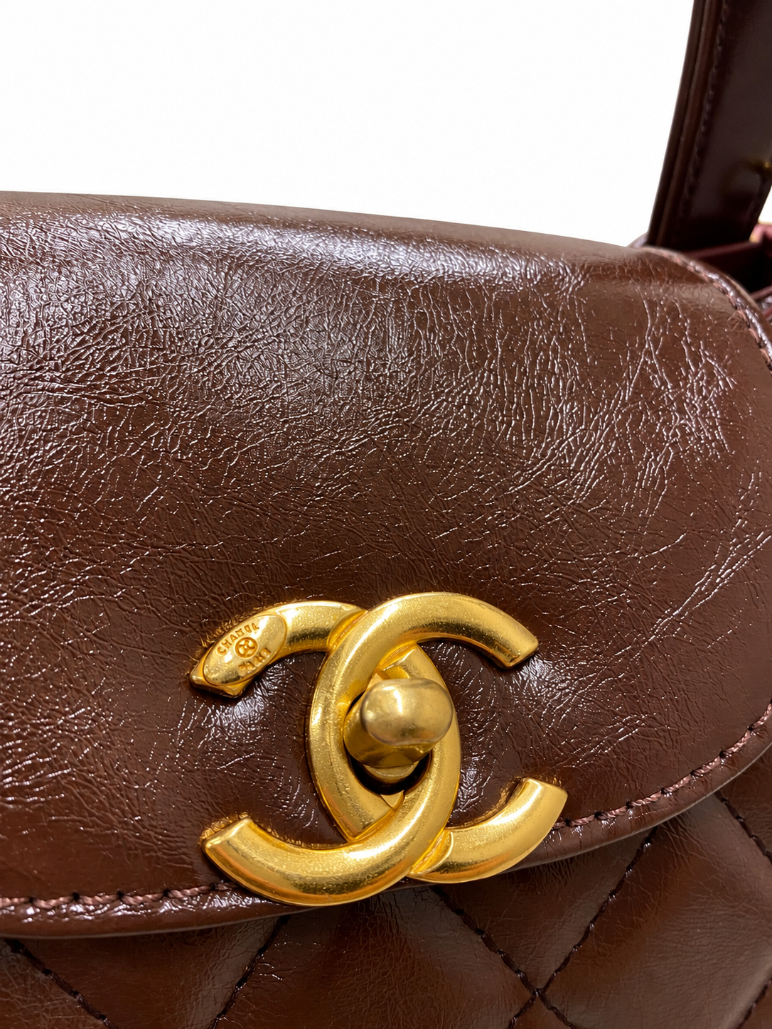 Black Quilted Top-Handle Bag with Gold Chain