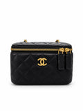 Chanel quilted black vanity case with gold-tone hardware