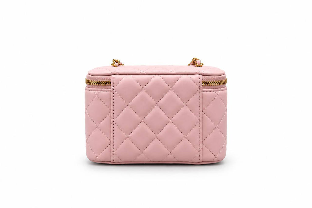 Chanel quilted black vanity case with gold-tone hardware