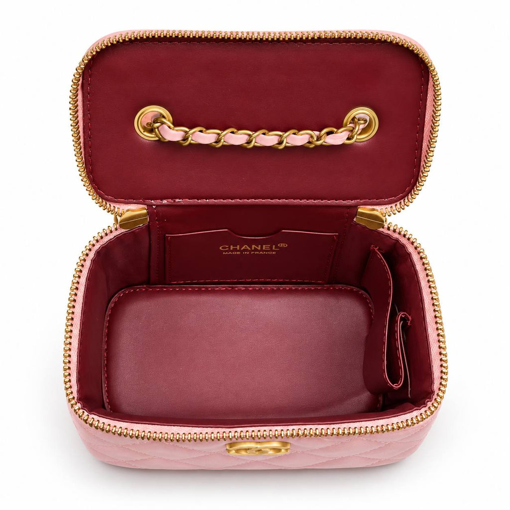 Chanel quilted black vanity case with gold-tone hardware